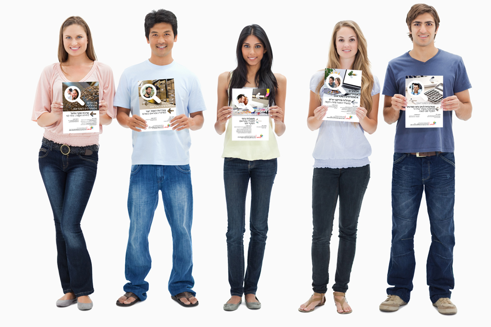People in jeans holding five signs against white background